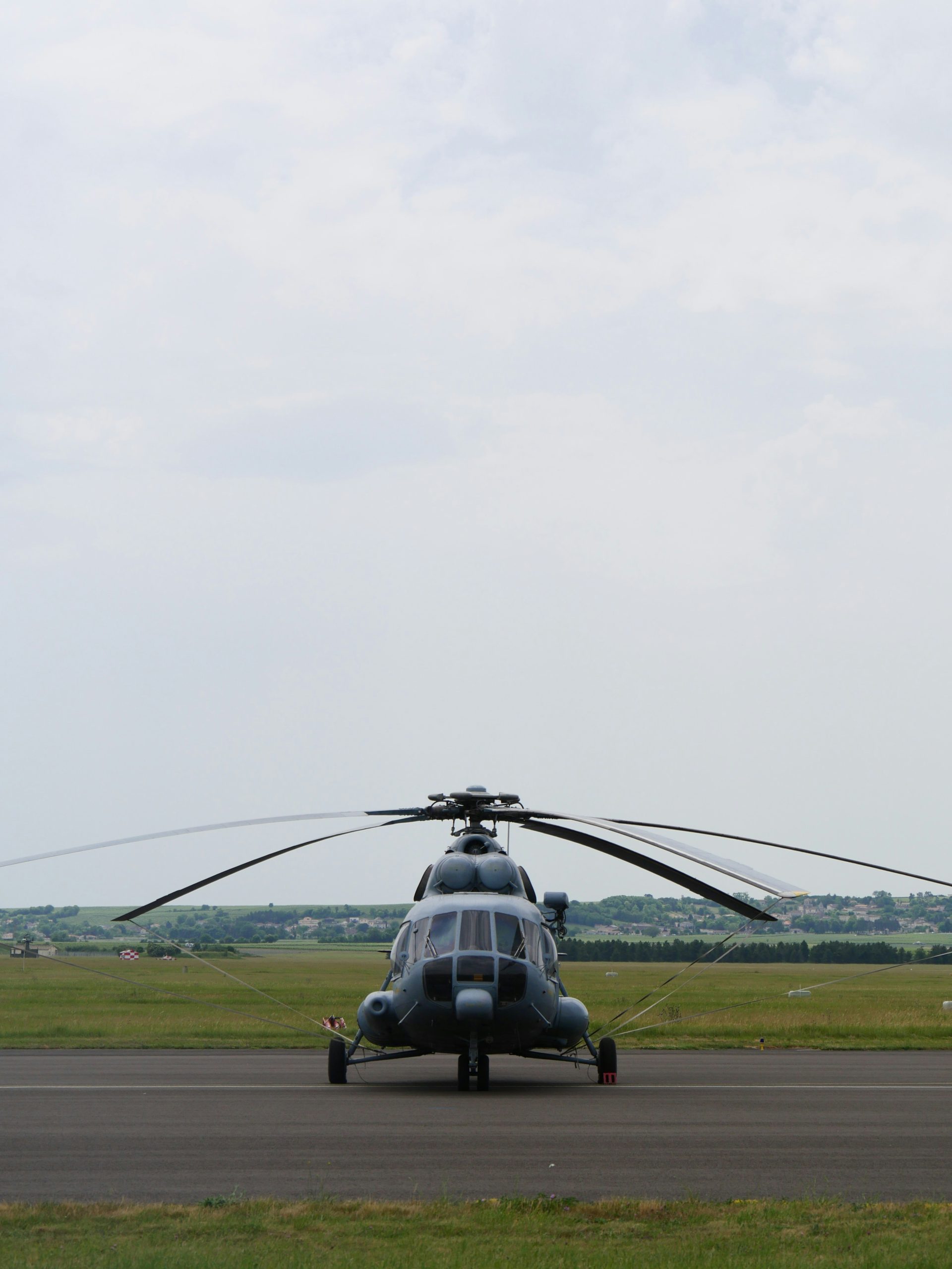 a helicopter on a runway